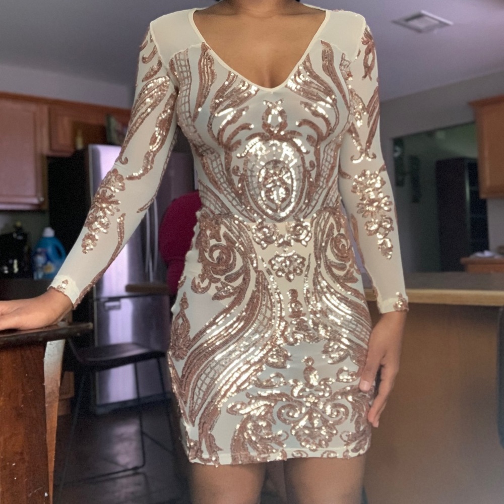 A mesh sequin rose gold dress, only worn once!